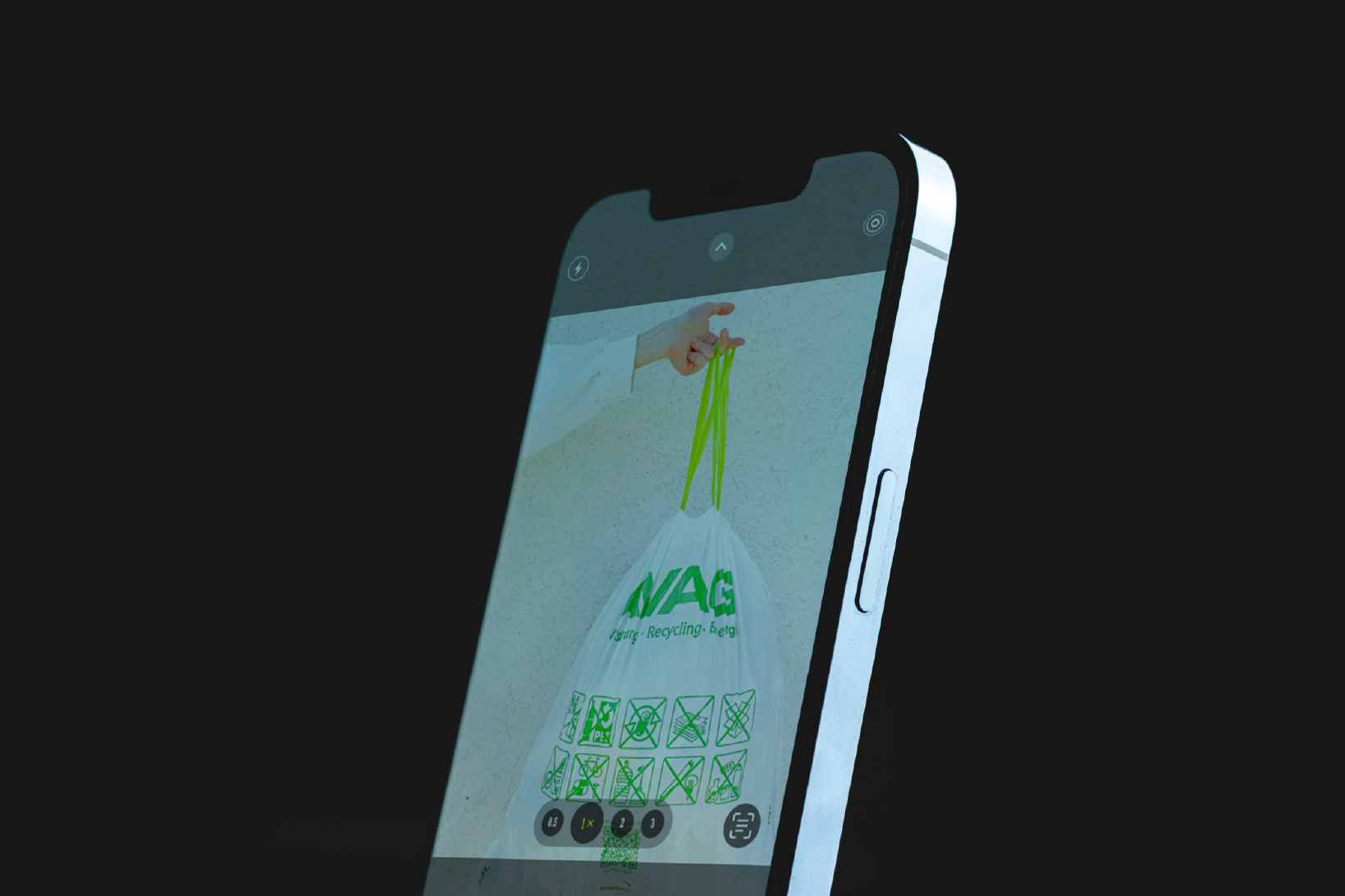 Black image in the middle a phone with the screen on a camera feature from an application